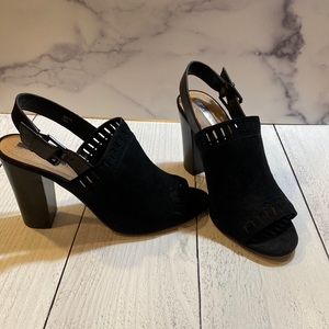 Black high heel open toed shoe